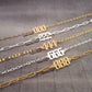 a row of gold and silver chains with numbers on them