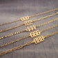 a row of gold chains with numbers on them