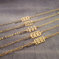 a row of gold chains with numbers on them