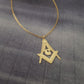 a gold necklace with a masonic symbol on it